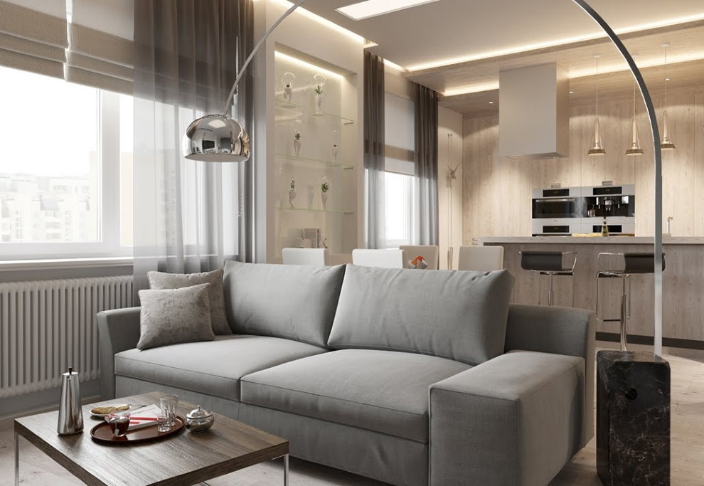 Прямой серый диван в кухне-гостиной двухкомнатной квартиры