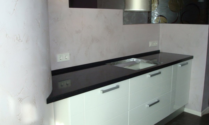 White kitchen with black worktop